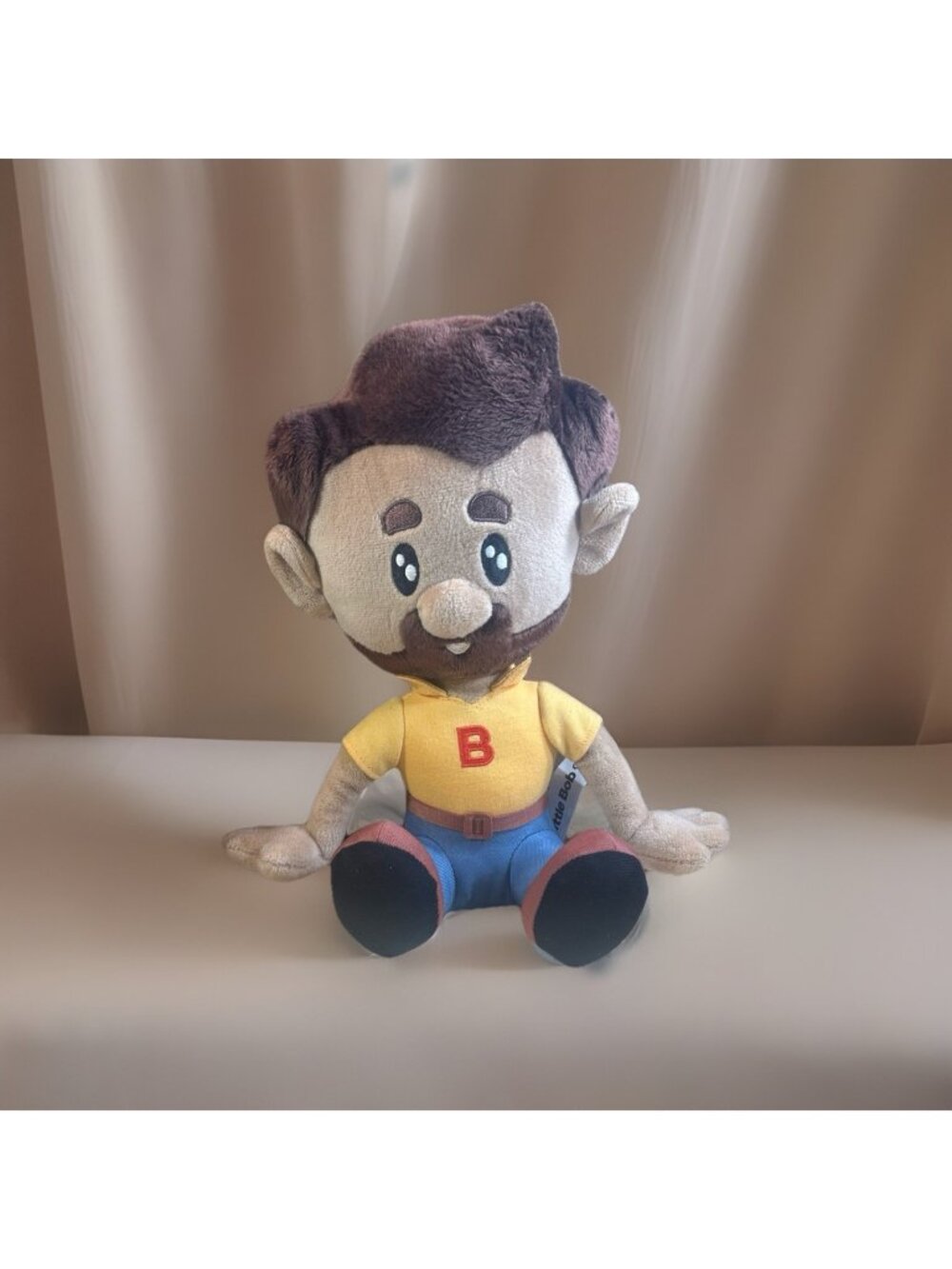 Bob’s Discount Furniture Little Bob 11’’ Sitting Promo Plush Stuffed Doll Toy